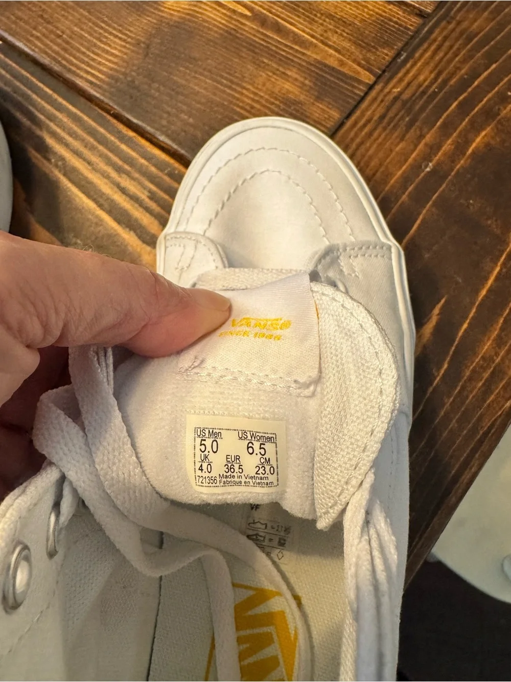 Vans White High-Top Canvas Sneakers with Yellow Logo Accent